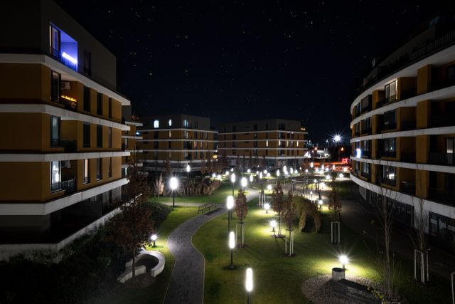 well-lit apartment complex at night